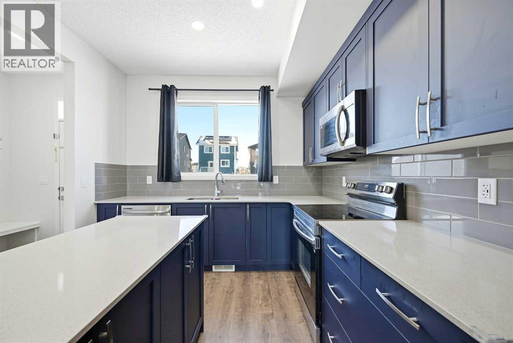185 Edith Green Nw, Calgary, AB - Indoor Photo Showing Kitchen With Upgraded Kitchen