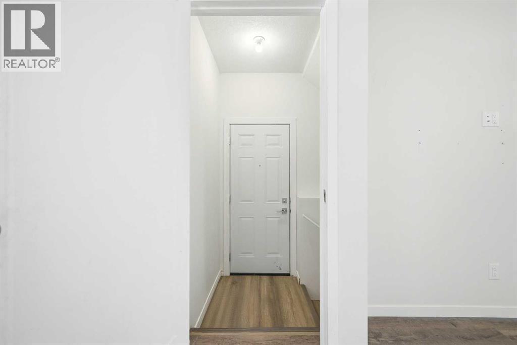 185 Edith Green Nw, Calgary, AB - Indoor Photo Showing Other Room