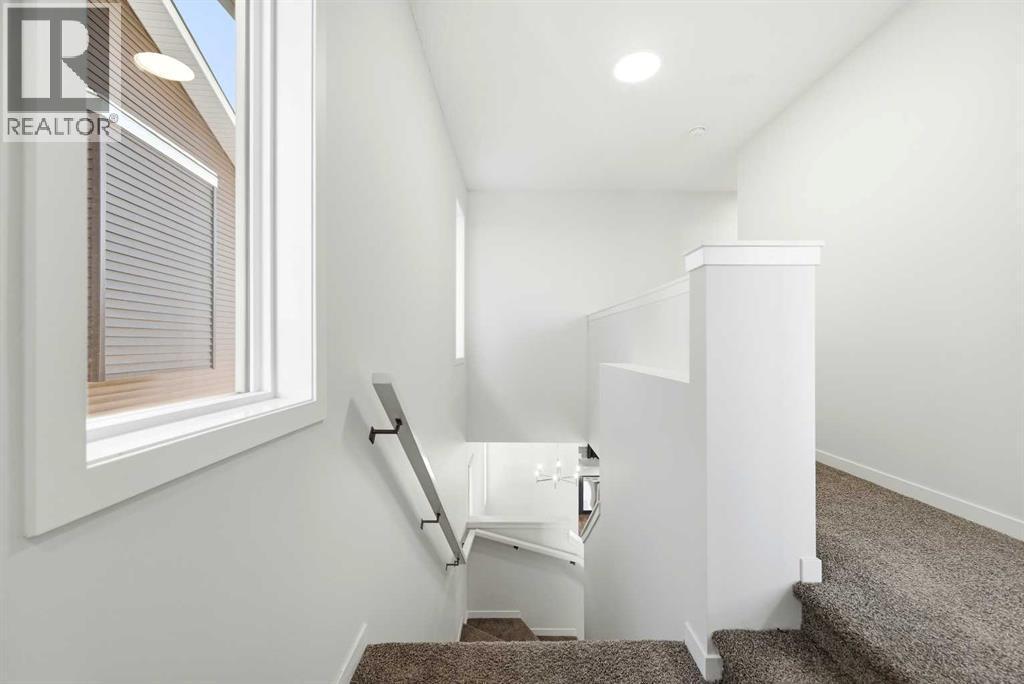 185 Edith Green Nw, Calgary, AB - Indoor Photo Showing Other Room