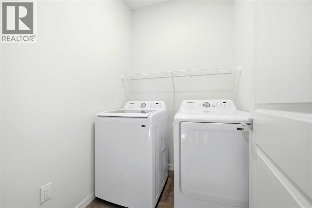 185 Edith Green Nw, Calgary, AB - Indoor Photo Showing Laundry Room