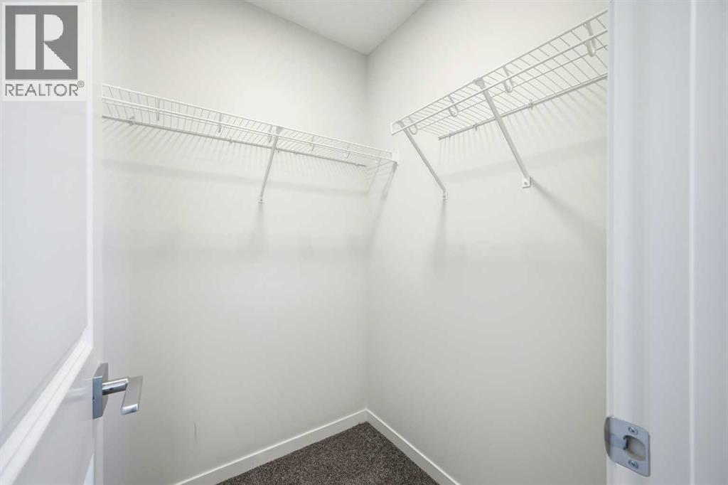 185 Edith Green Nw, Calgary, AB - Indoor With Storage