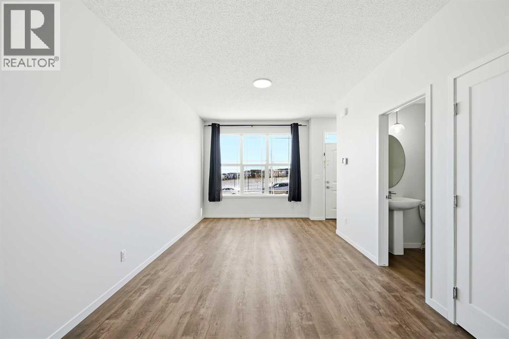 185 Edith Green Nw, Calgary, AB - Indoor Photo Showing Other Room