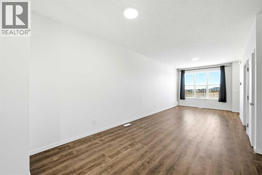 185 Edith Green Nw, Calgary, AB - Indoor Photo Showing Other Room