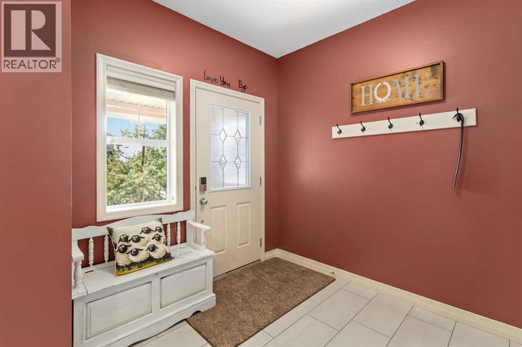 112 Sunset View, Cochrane, AB - Indoor Photo Showing Other Room