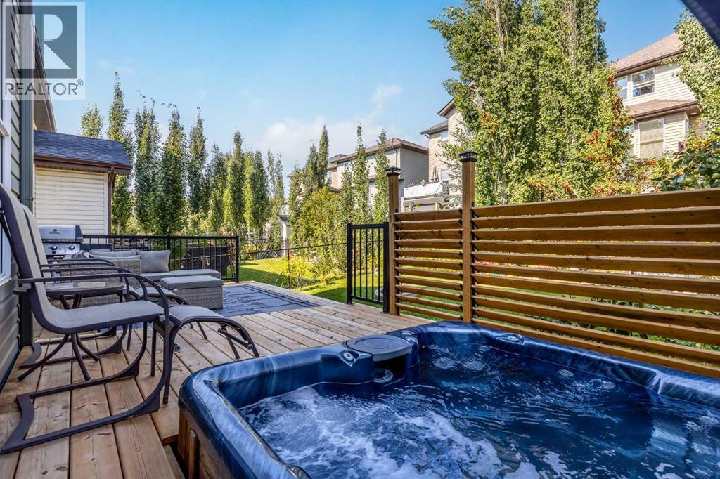 112 Sunset View, Cochrane, AB - Outdoor With Deck Patio Veranda With Exterior