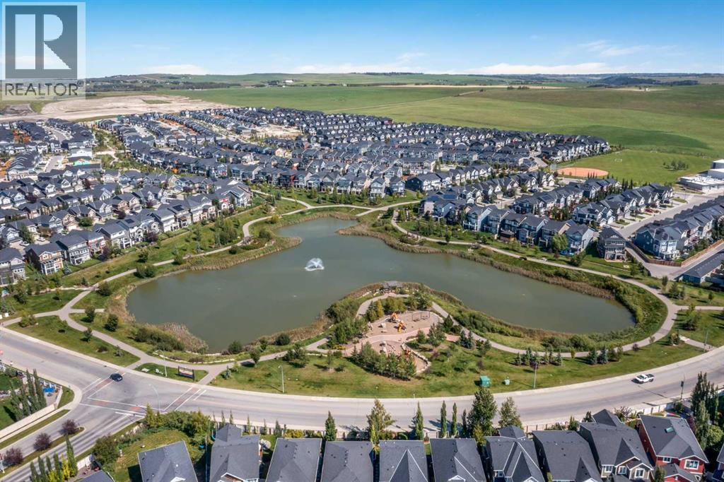 112 Sunset View, Cochrane, AB - Outdoor With Body Of Water With View