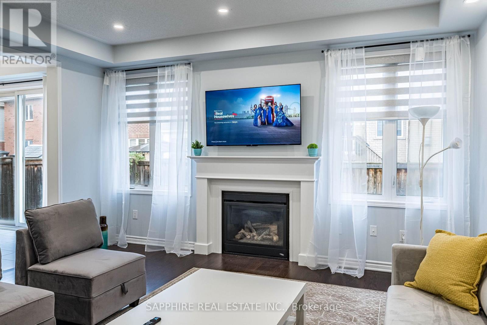 325 Trudeau Drive E, Milton, ON - Indoor Photo Showing Living Room With Fireplace