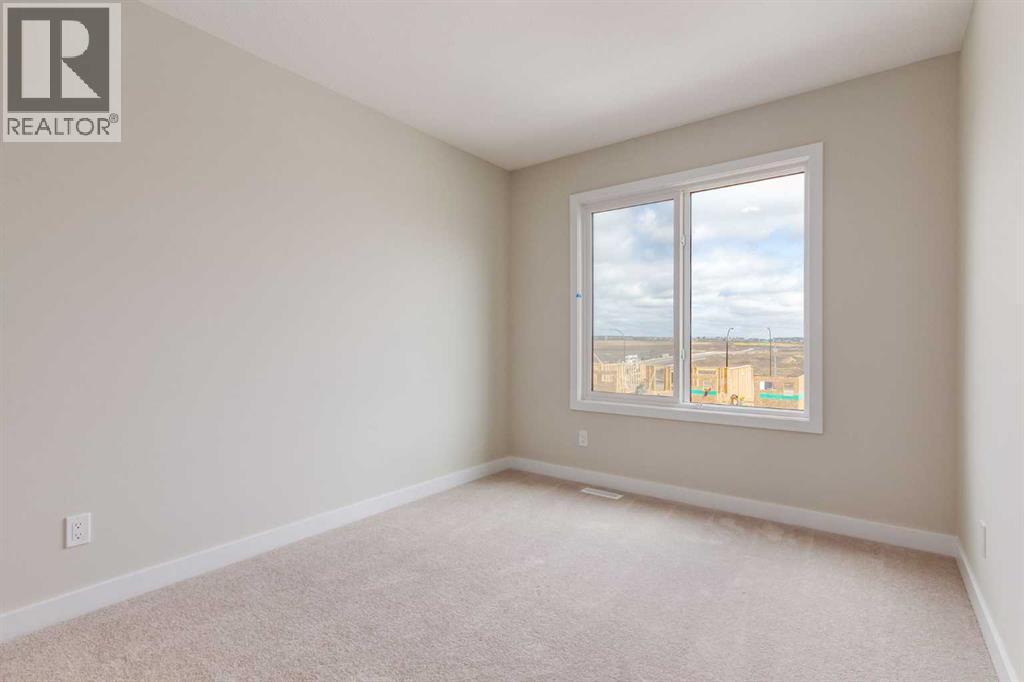 466 River Avenue, Cochrane, AB - Indoor Photo Showing Other Room