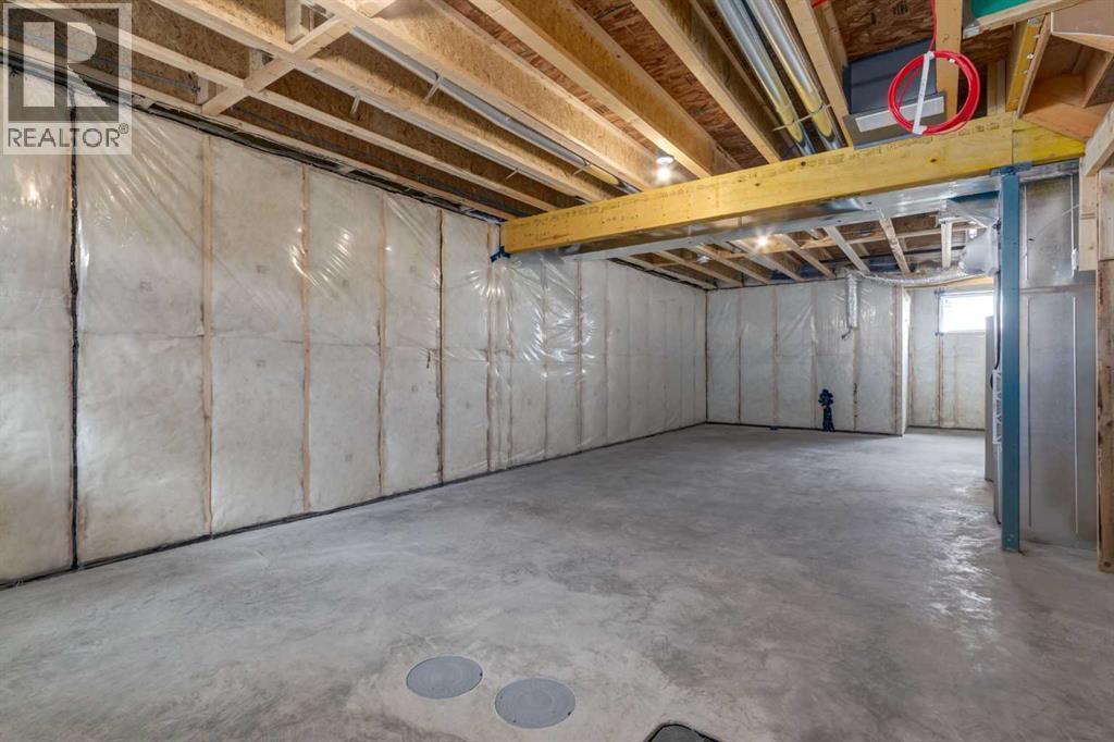 466 River Avenue, Cochrane, AB - Indoor Photo Showing Basement