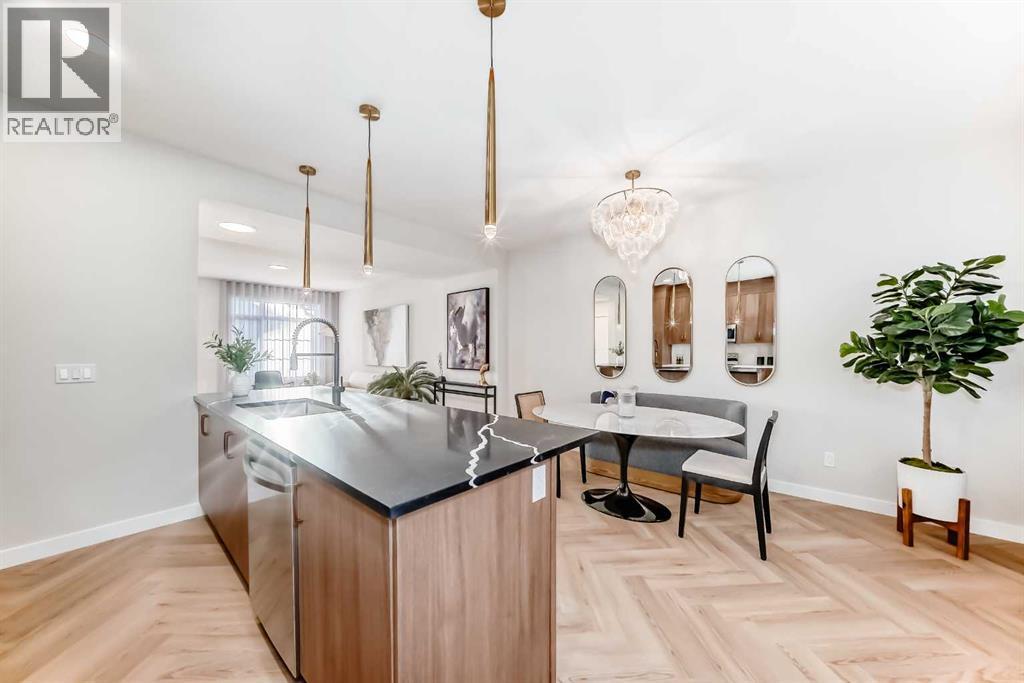 94 Agate Road, Cochrane, AB - Indoor Photo Showing Kitchen With Double Sink