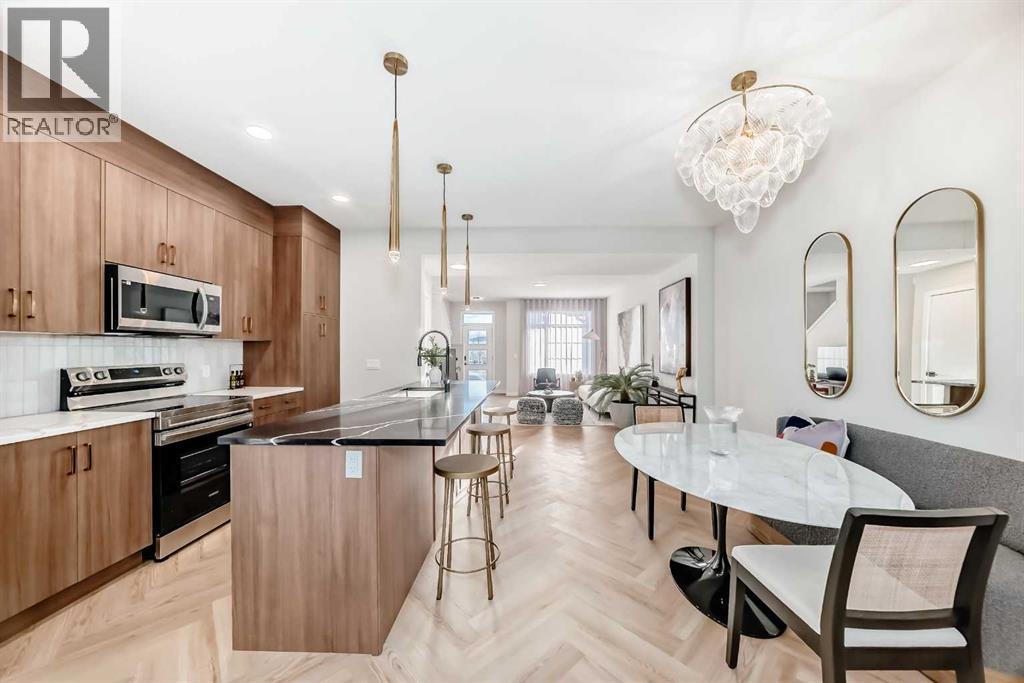 94 Agate Road, Cochrane, AB - Indoor Photo Showing Kitchen With Upgraded Kitchen