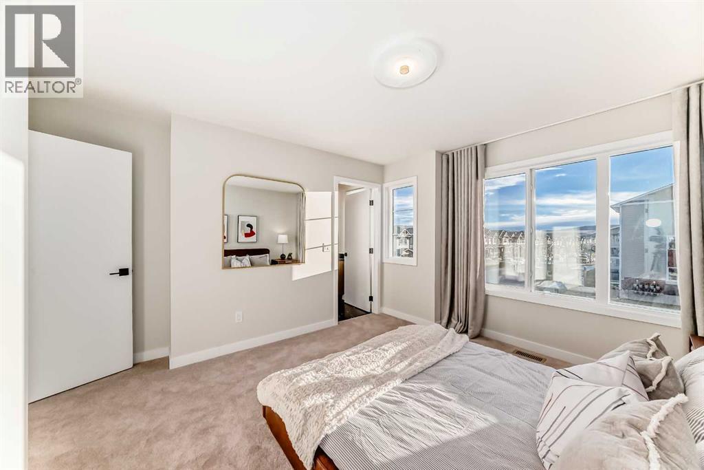 94 Agate Road, Cochrane, AB - Indoor Photo Showing Bedroom