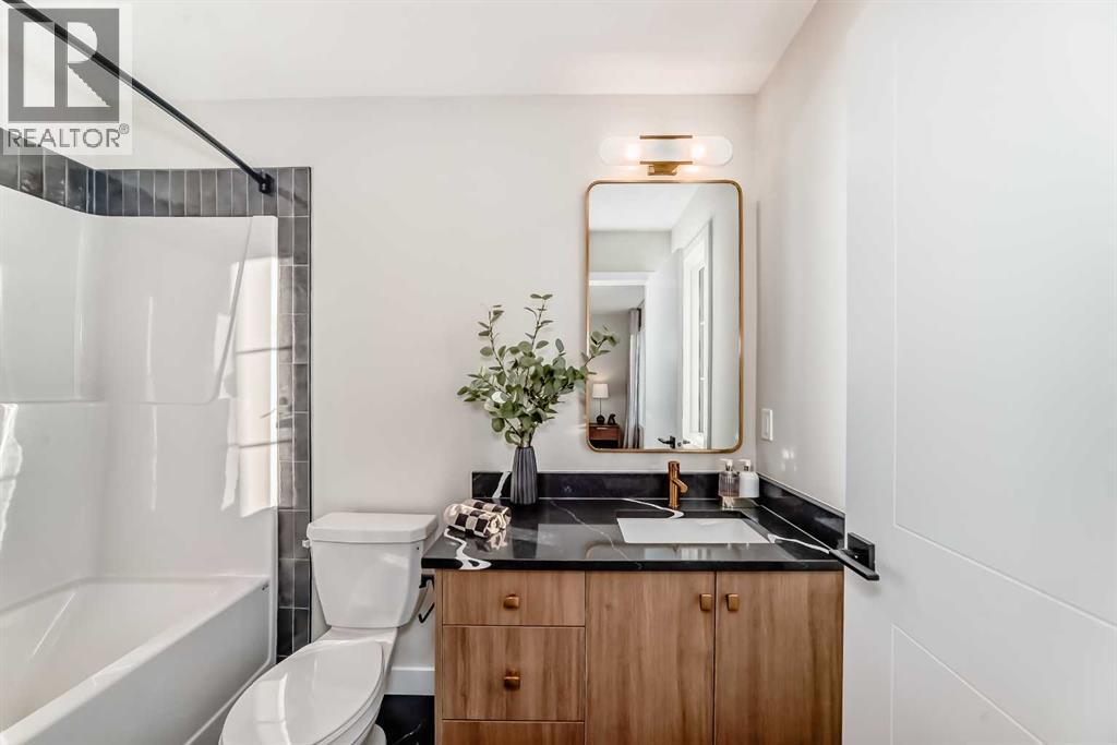 94 Agate Road, Cochrane, AB - Indoor Photo Showing Bathroom