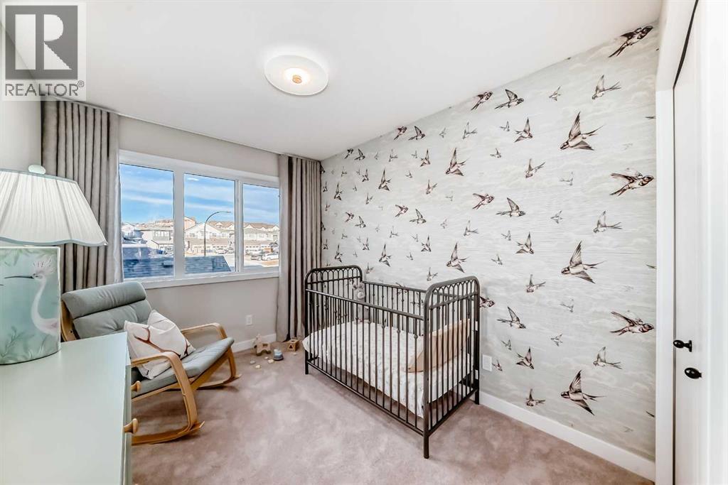 94 Agate Road, Cochrane, AB - Indoor Photo Showing Bedroom