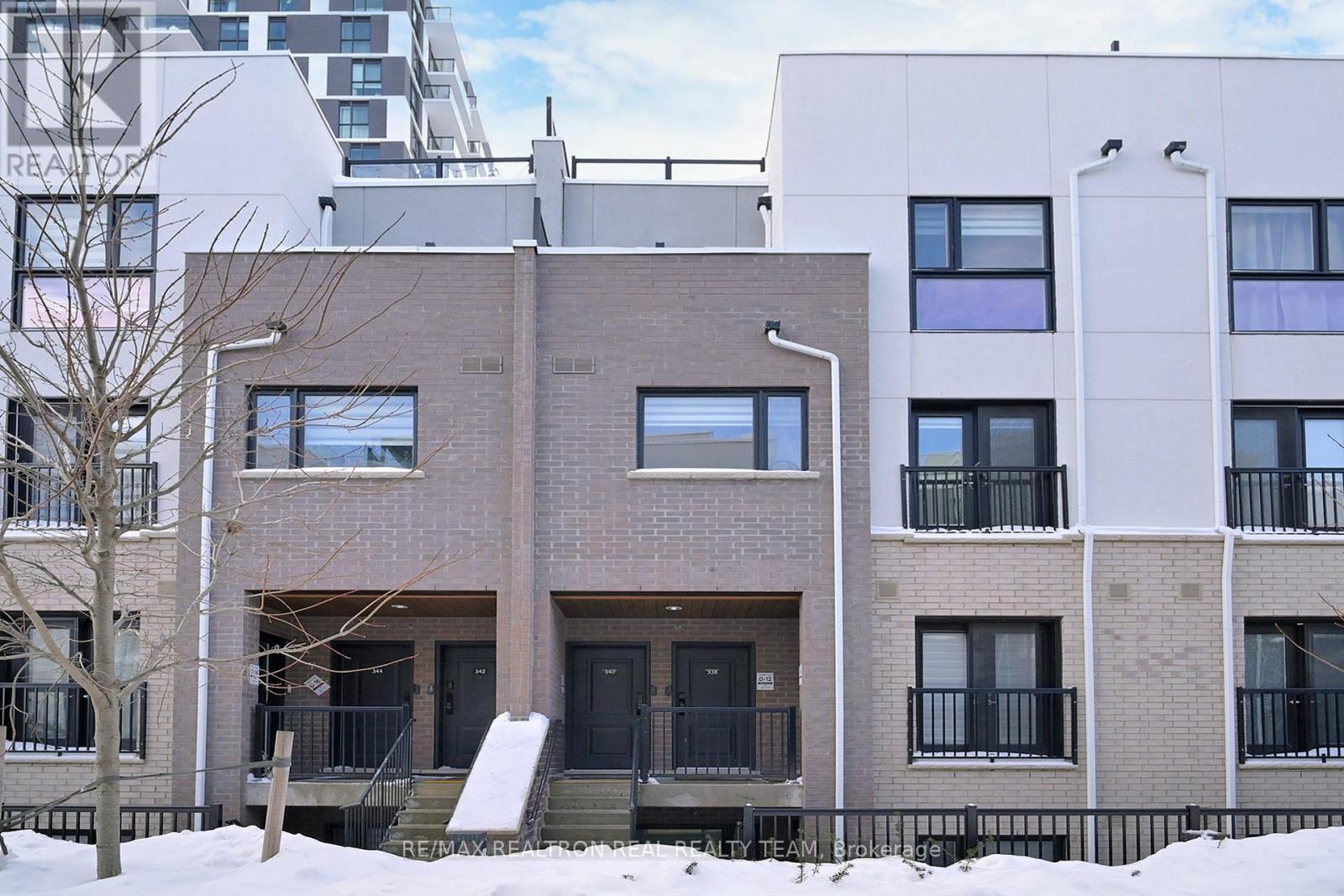 338 - 349 Wheat Boom Drive, Oakville, ON - Outdoor With Balcony With Facade