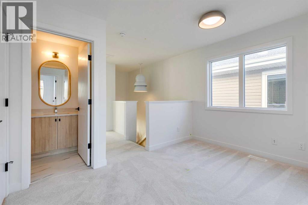 98 Agate Road, Cochrane, AB - Indoor Photo Showing Other Room