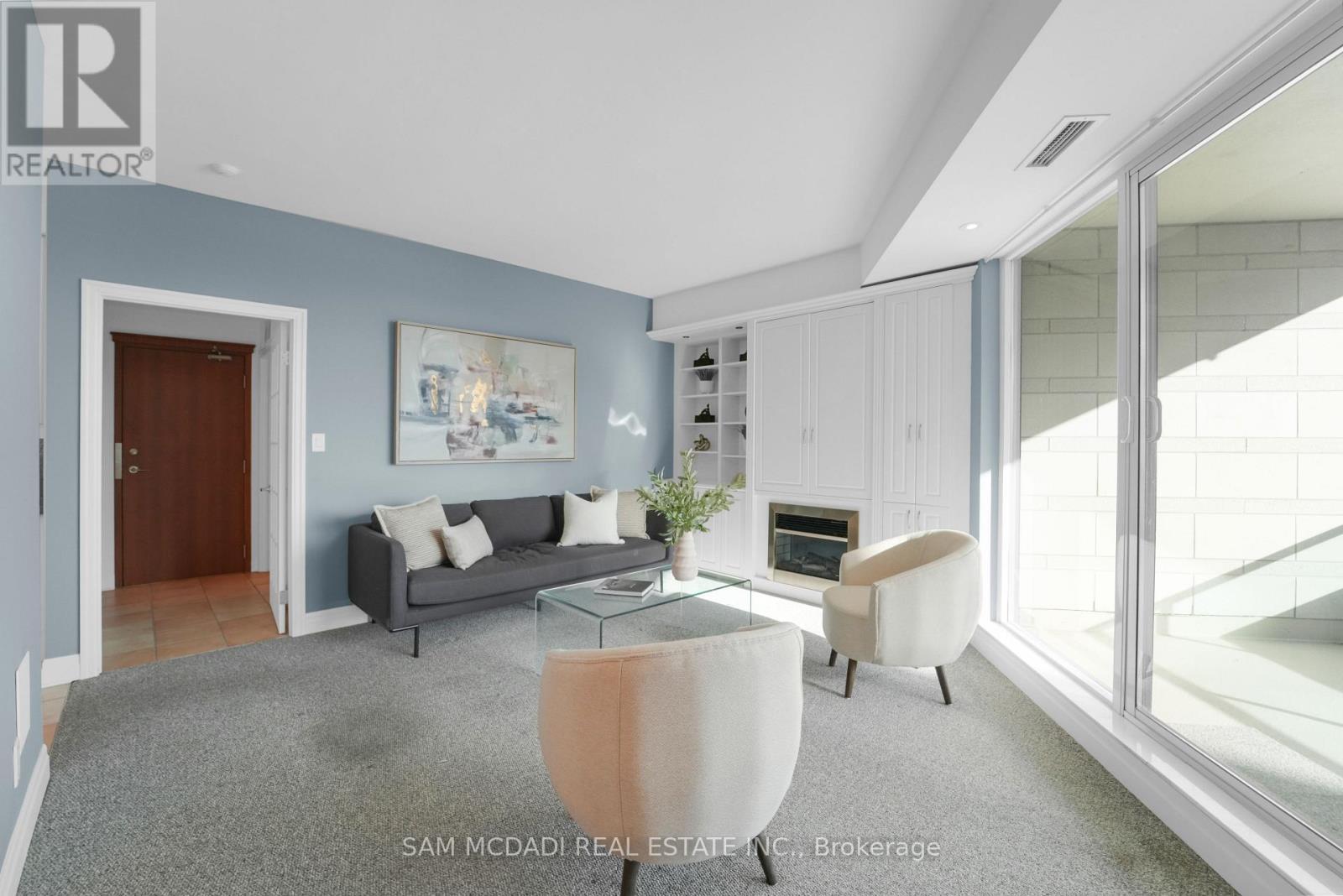 509 - 65 Port Street E, Mississauga, ON - Indoor Photo Showing Other Room With Fireplace