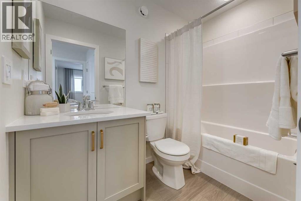 PLEASE NOTE: Photos are of a finished Showhome of the same model – fit and finish may differ on finished spec home. Interior selections and floorplans shown in photos - 62 Starling Boulevard Nw, Calgary, AB - Indoor Photo Showing Bathroom