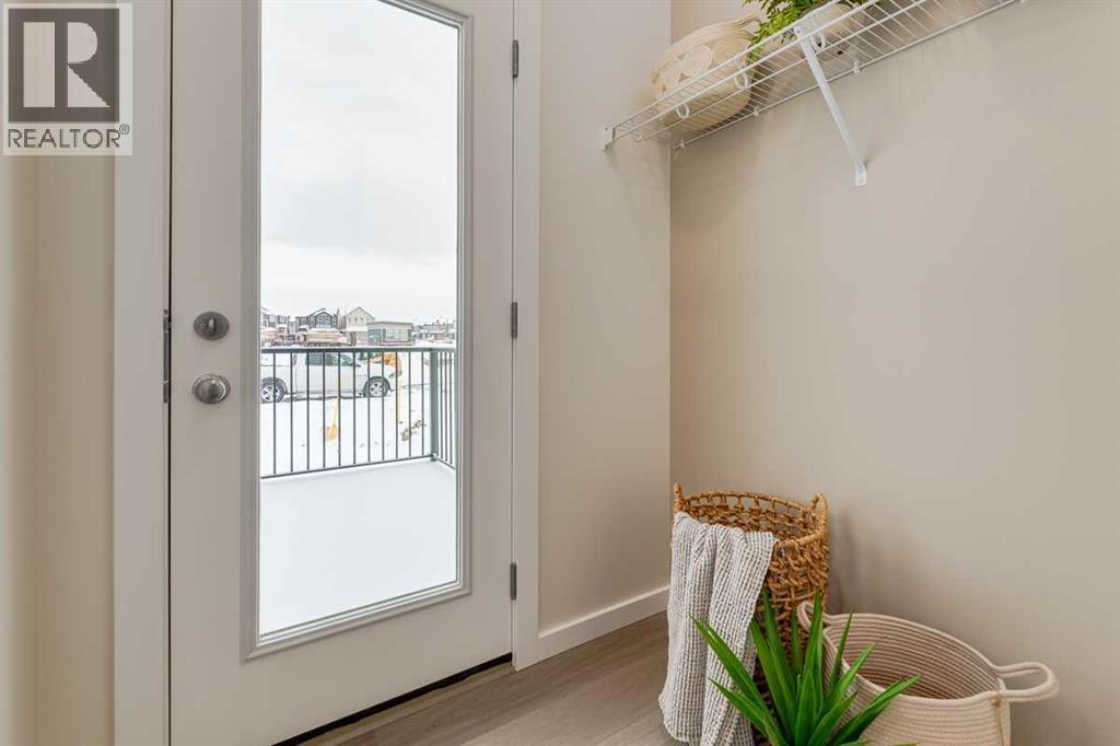 PLEASE NOTE: Photos are of a finished Showhome of the same model – fit and finish may differ on finished spec home. Interior selections and floorplans shown in photos - 62 Starling Boulevard Nw, Calgary, AB - Indoor