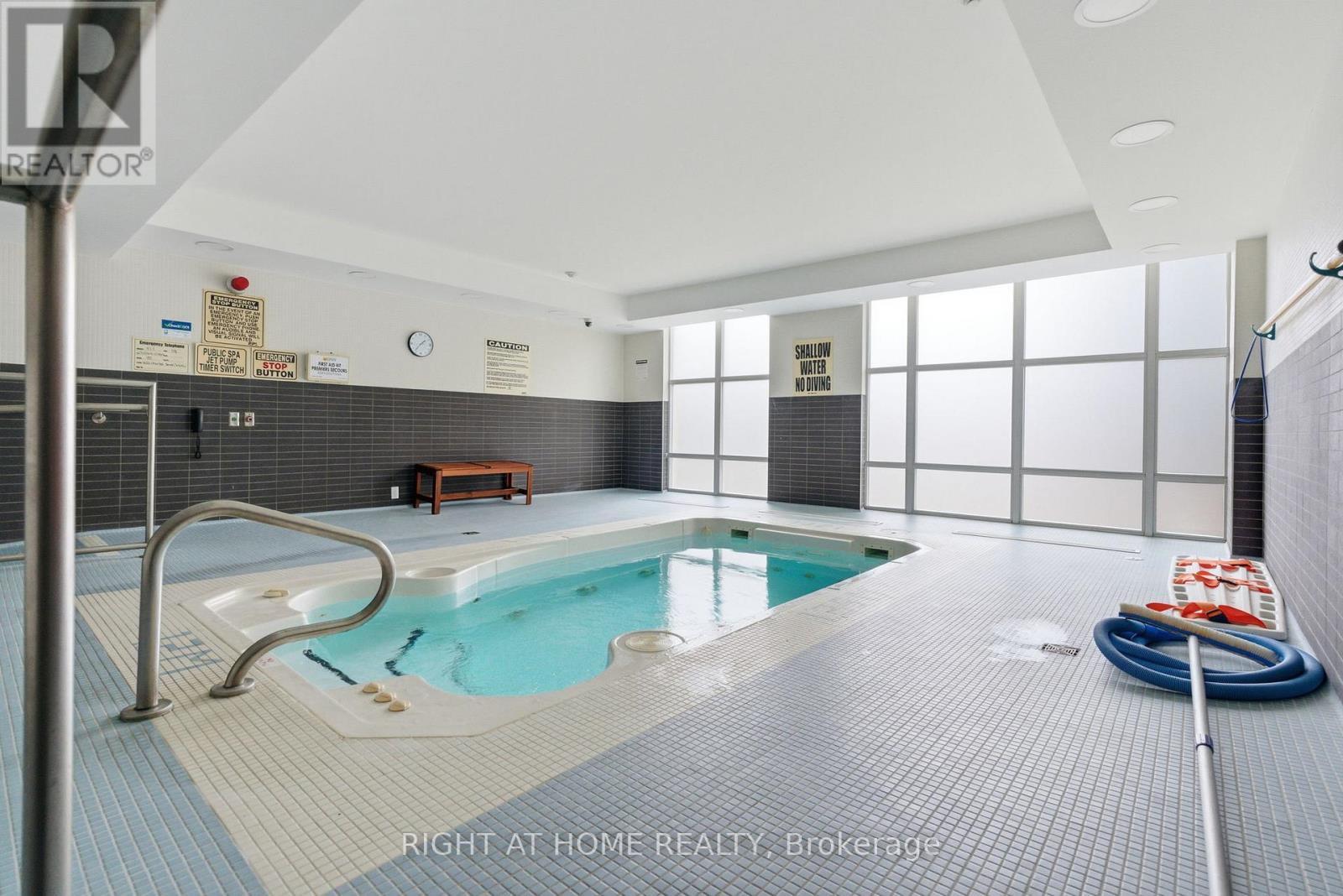 711 - 1600 Charles Street, Whitby (Port Whitby), ON - Indoor Photo Showing Other Room With In Ground Pool