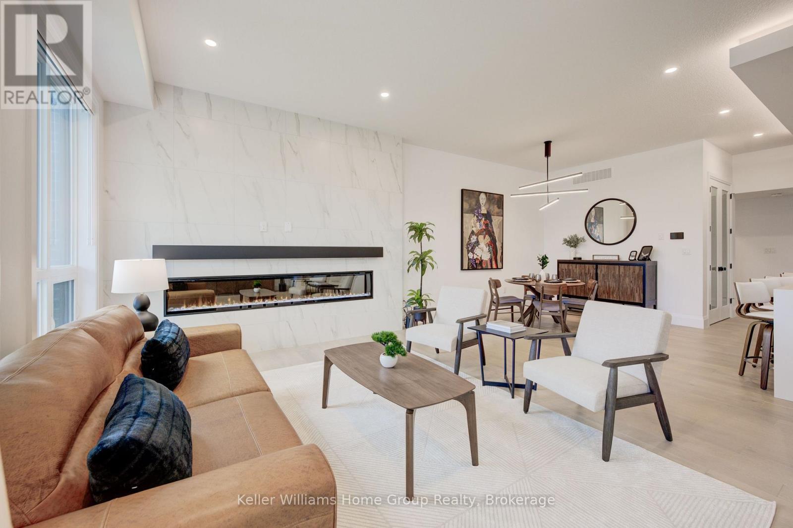62 Lovett Lane, Guelph (Kortright West), ON - Indoor Photo Showing Living Room With Fireplace