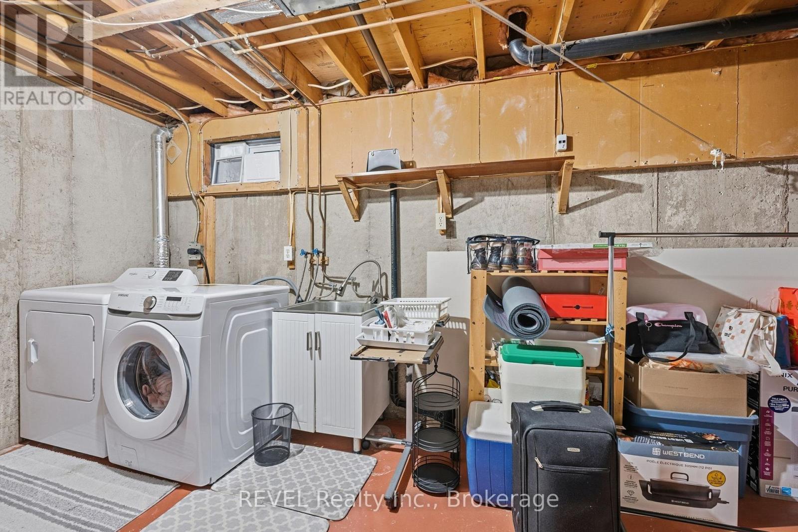 69 - 6767 Thorold Stone Road, Niagara Falls (Stamford), ON - Indoor Photo Showing Laundry Room