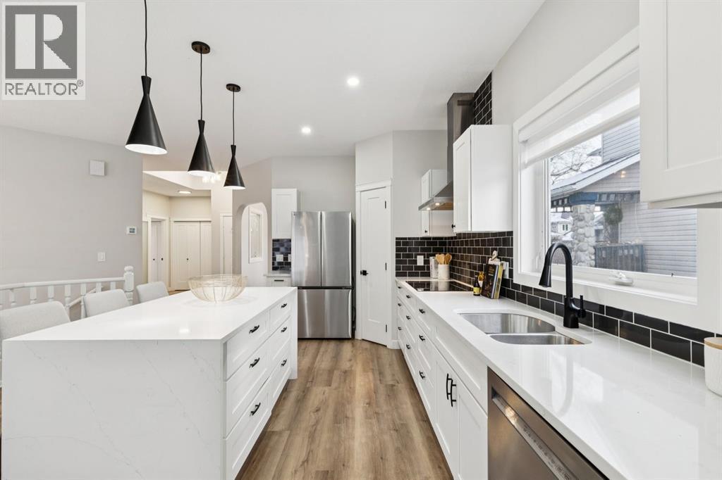 230 Chaparral Place Se, Calgary, AB - Indoor Photo Showing Kitchen With Stainless Steel Kitchen With Double Sink With Upgraded Kitchen