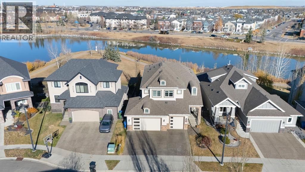 52 Elgin Estates View Se, Calgary, AB - Outdoor With Body Of Water With Facade