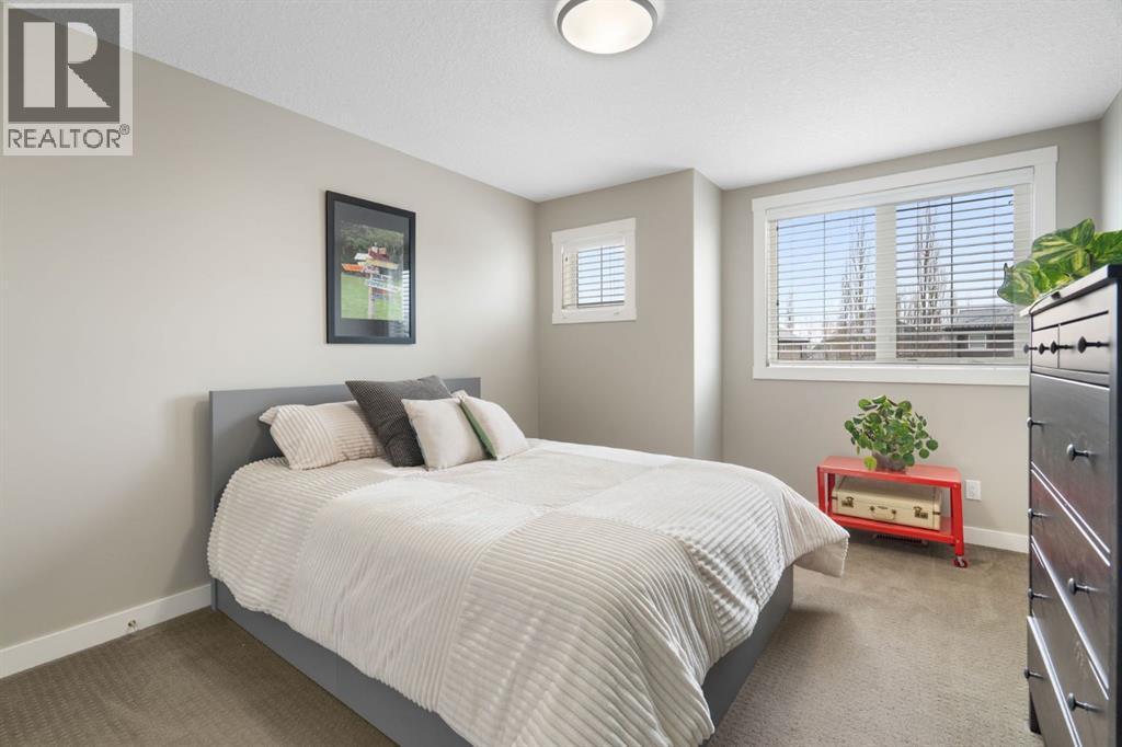 52 Elgin Estates View Se, Calgary, AB - Indoor Photo Showing Bedroom