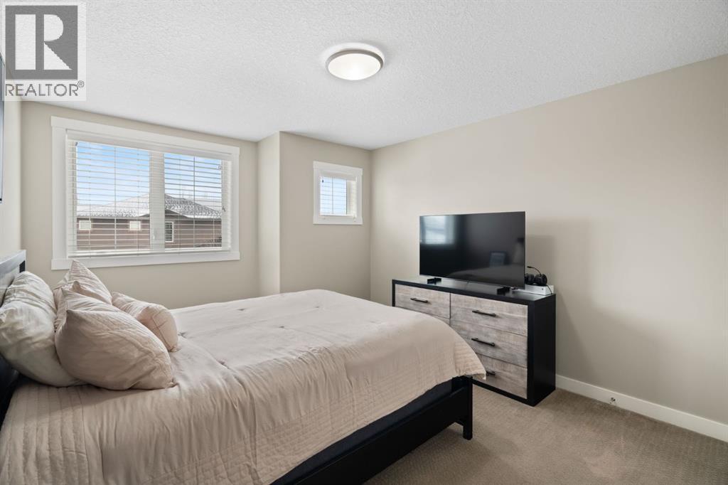 52 Elgin Estates View Se, Calgary, AB - Indoor Photo Showing Bedroom