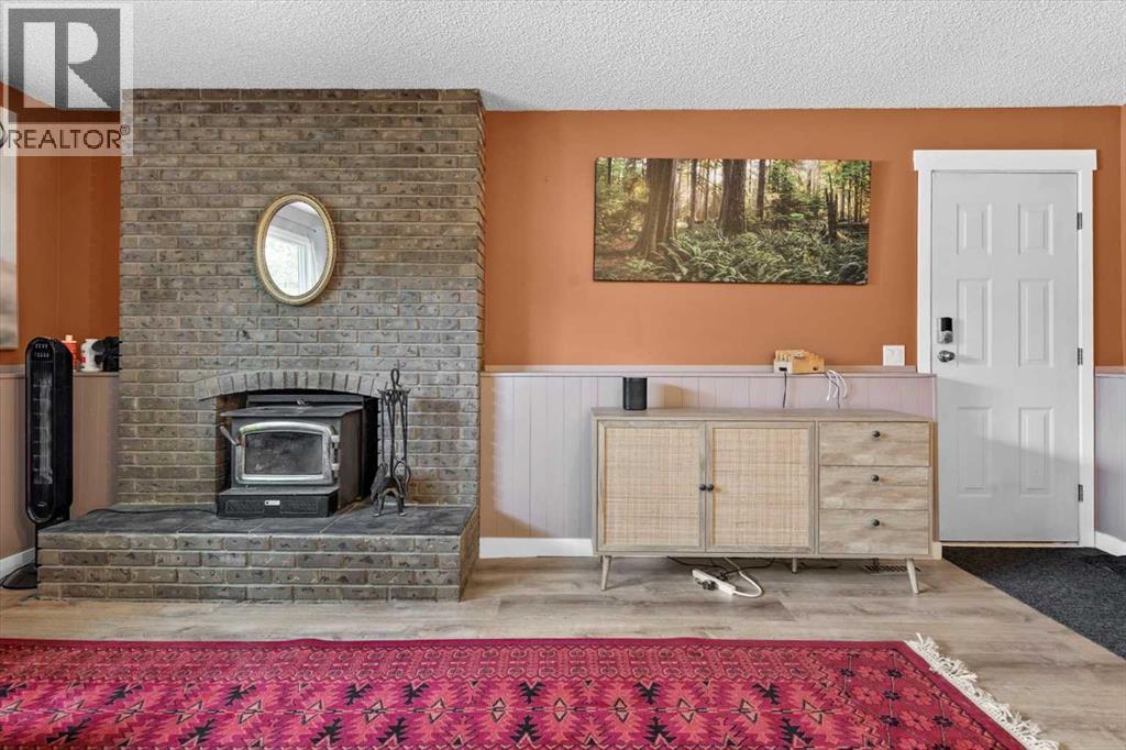 40 Bergen Place Nw, Calgary, AB - Indoor With Fireplace