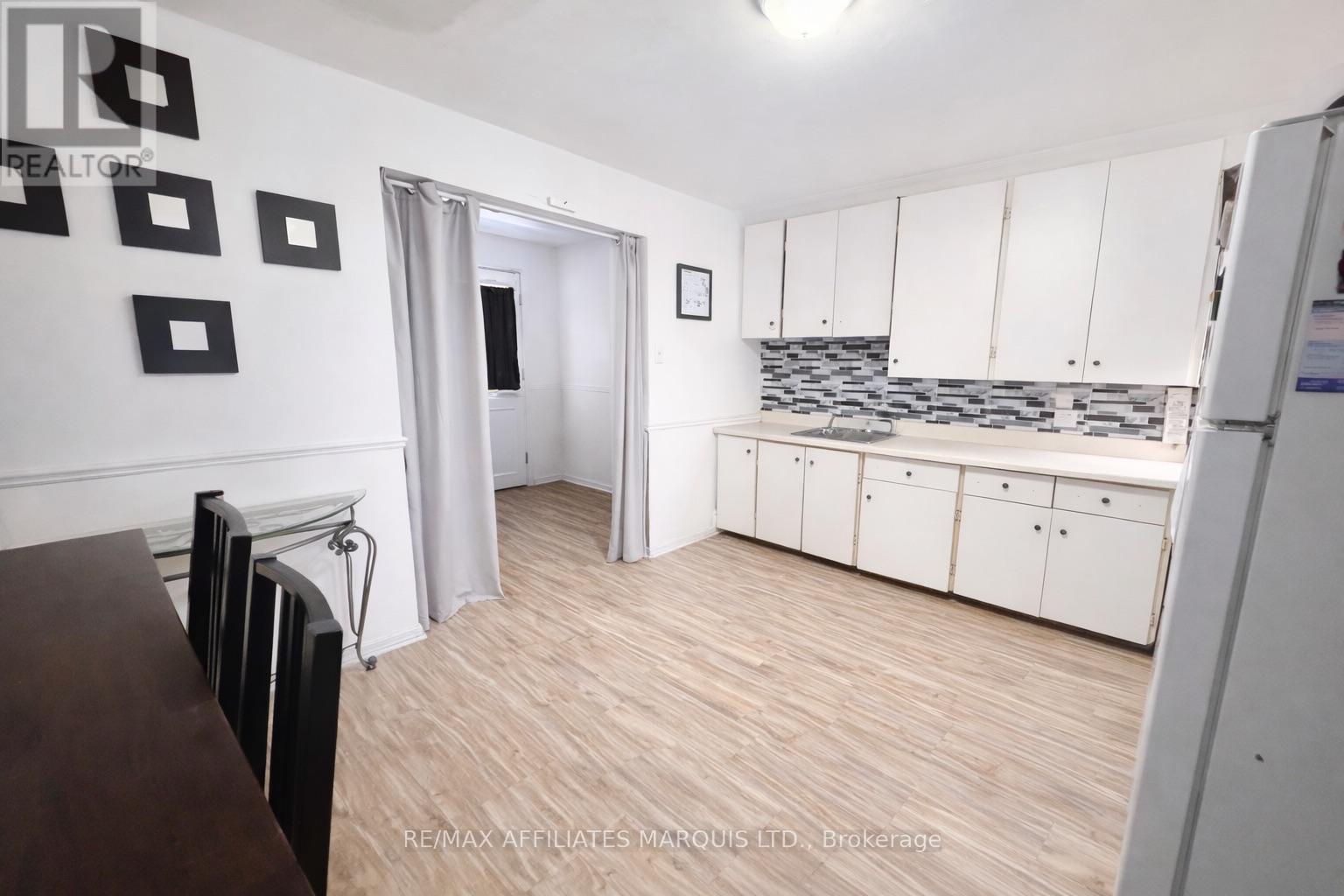 206. Items removed from photo via AI generator - 204-206 Guy Street, Cornwall, ON - Indoor Photo Showing Kitchen