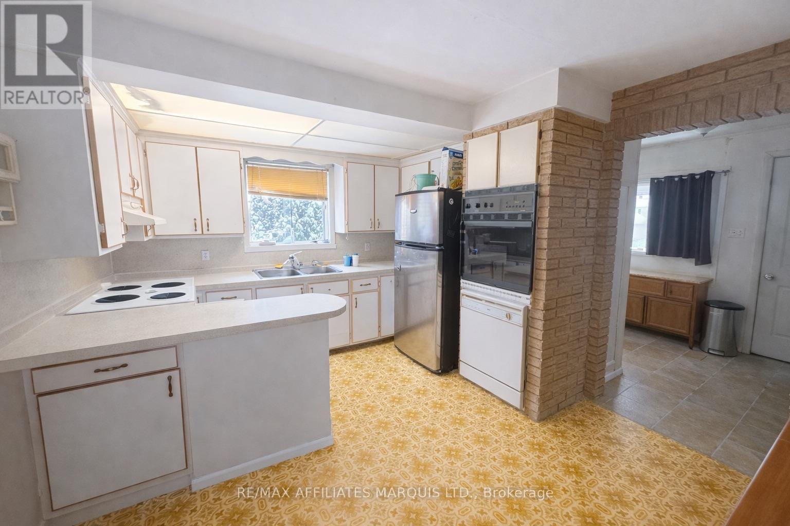 204. Items removed from photo via AI generator - 204-206 Guy Street, Cornwall, ON - Indoor Photo Showing Kitchen With Double Sink