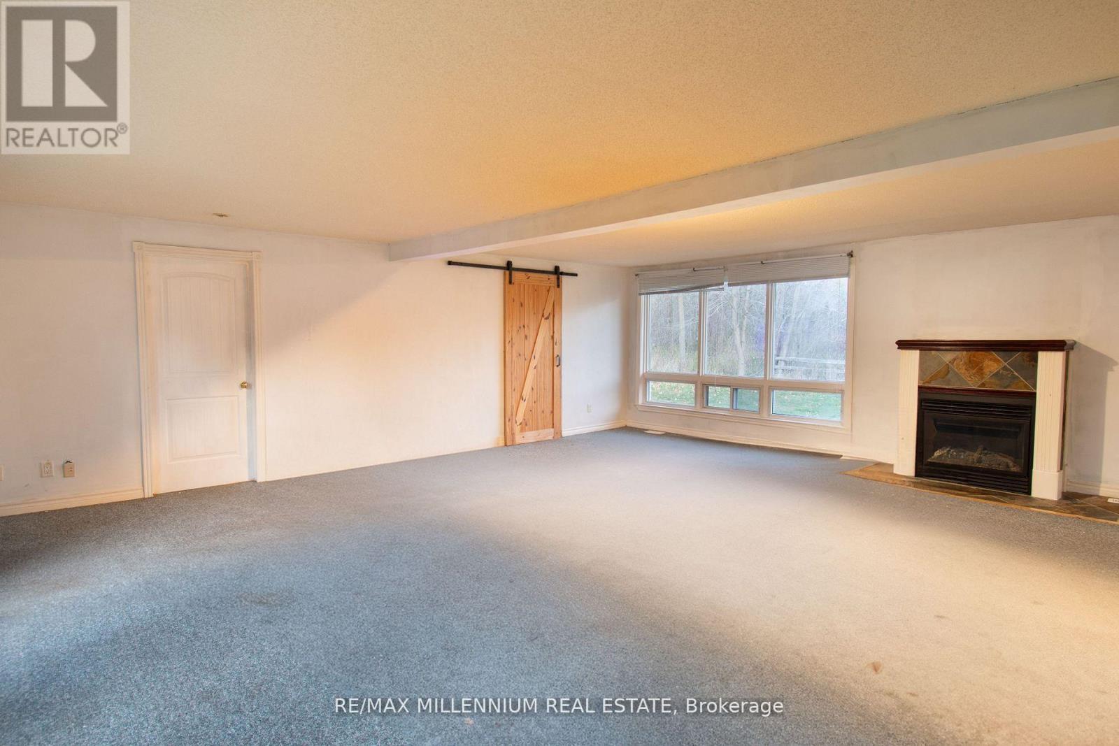 3021 Pinegrove Road, Springwater, ON - Indoor With Fireplace