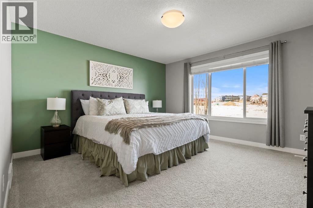 85 Mount Rae Heights, Okotoks, AB - Indoor Photo Showing Bedroom