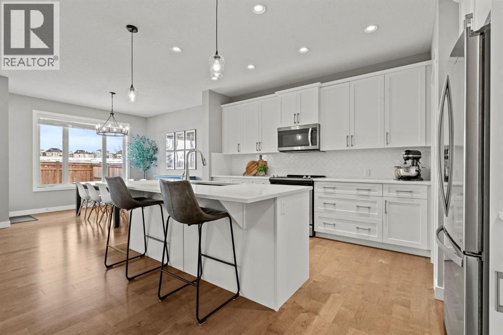 85 Mount Rae Heights, Okotoks, AB - Indoor Photo Showing Kitchen With Stainless Steel Kitchen With Upgraded Kitchen