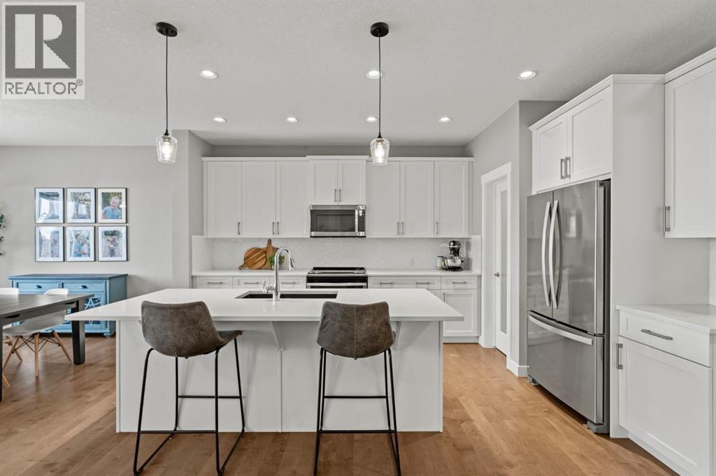 85 Mount Rae Heights, Okotoks, AB - Indoor Photo Showing Kitchen With Stainless Steel Kitchen With Upgraded Kitchen