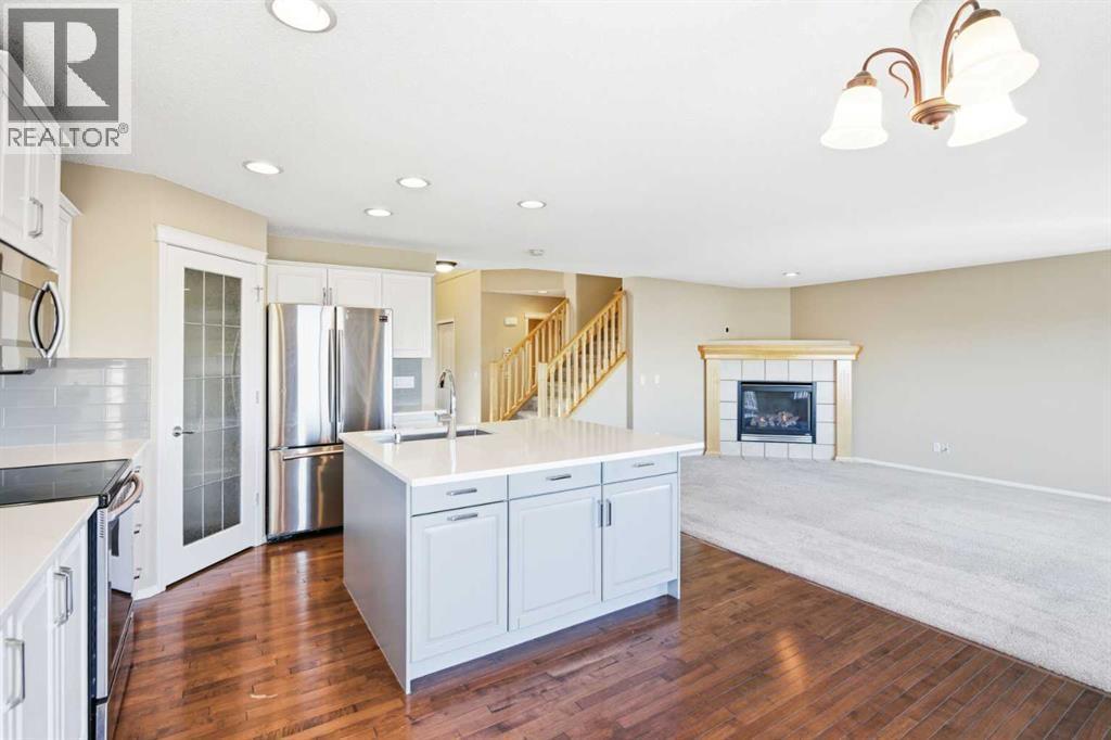 202 Panamount Court Nw, Calgary, AB - Indoor Photo Showing Kitchen With Upgraded Kitchen