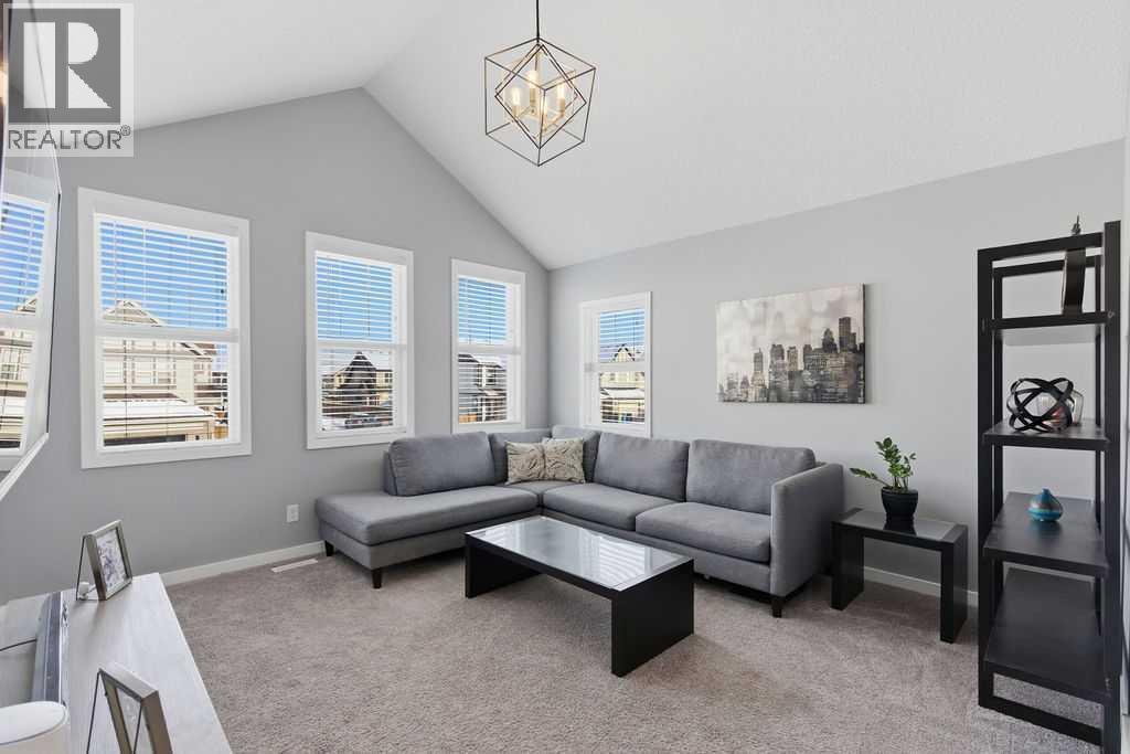 Bonus room with vaulted ceiling - 105 Chaparral Valley Crescent Se, Calgary, AB - Indoor Photo Showing Living Room