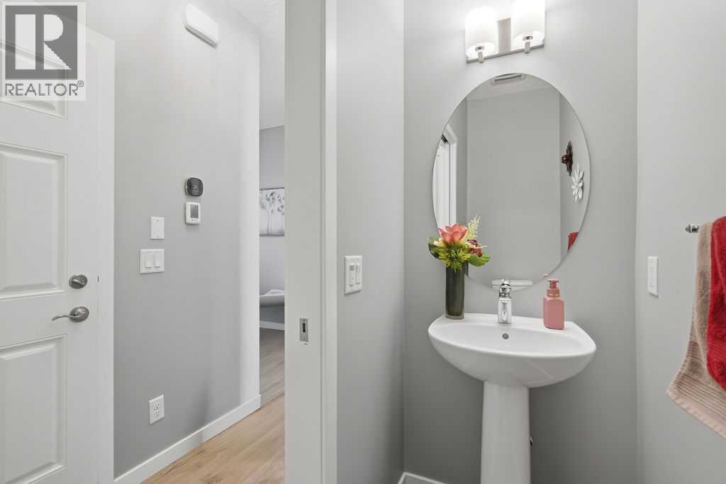 Main floor powder room - 105 Chaparral Valley Crescent Se, Calgary, AB - Indoor Photo Showing Bathroom