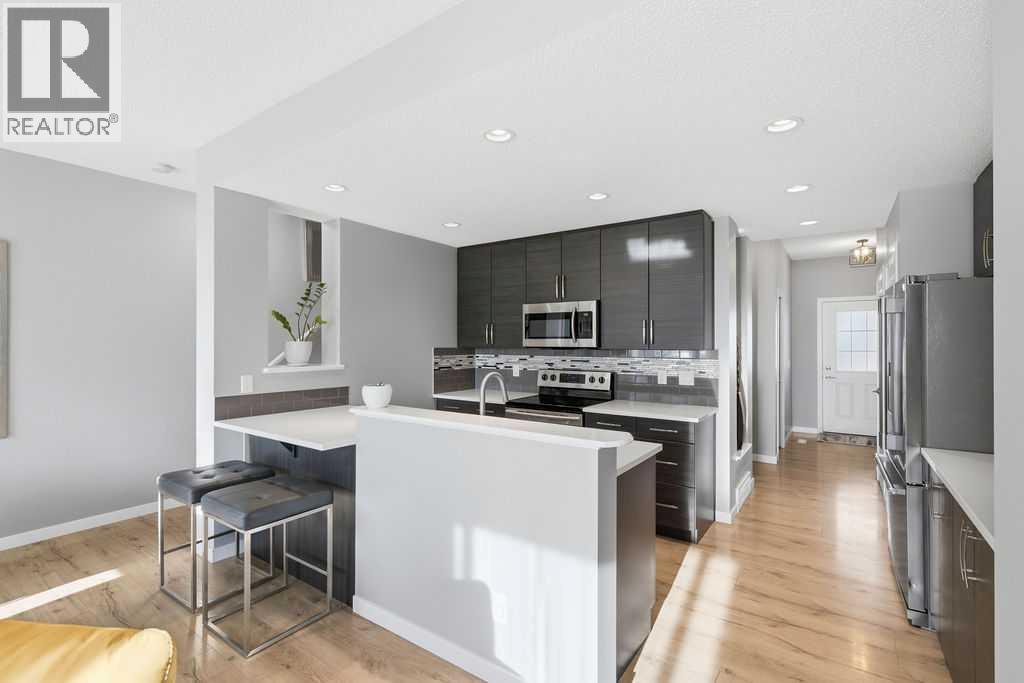 105 Chaparral Valley Crescent Se, Calgary, AB - Indoor Photo Showing Kitchen With Upgraded Kitchen