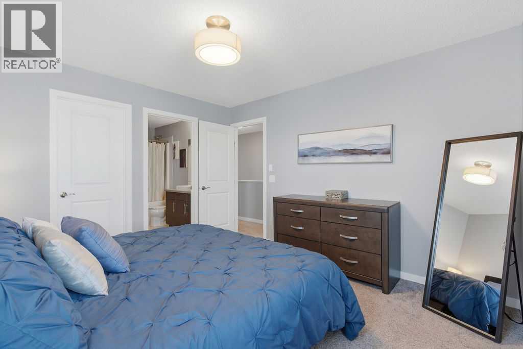 105 Chaparral Valley Crescent Se, Calgary, AB - Indoor Photo Showing Bedroom