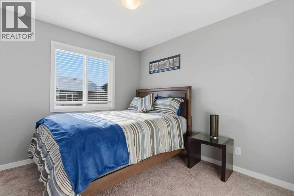 Bedroom #2 - 105 Chaparral Valley Crescent Se, Calgary, AB - Indoor Photo Showing Bedroom