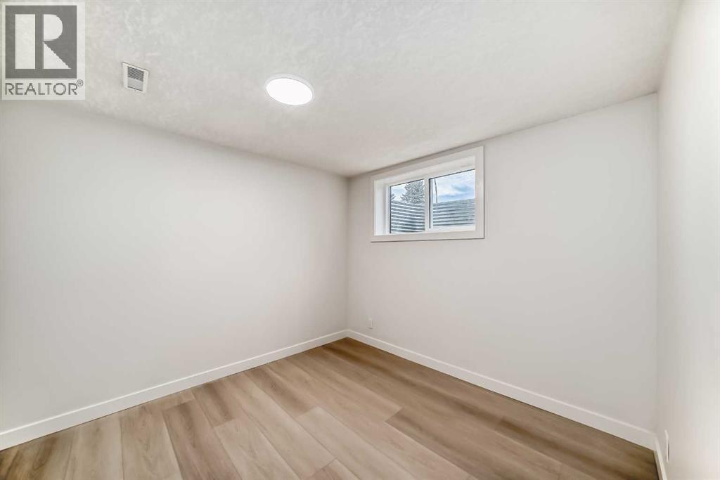 1242 Mardale Drive Ne, Calgary, AB - Indoor Photo Showing Other Room