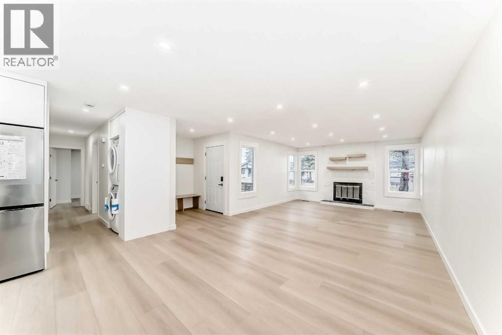 1242 Mardale Drive Ne, Calgary, AB - Indoor With Fireplace