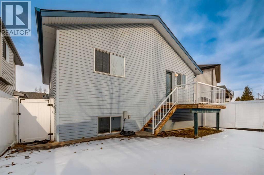 140 Stonegate Close Nw, Airdrie, AB - Outdoor With Deck Patio Veranda With Exterior