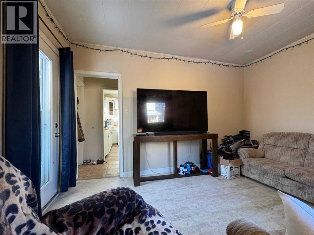 Living Room - 718 10 Street S, Lethbridge, AB - Indoor Photo Showing Other Room