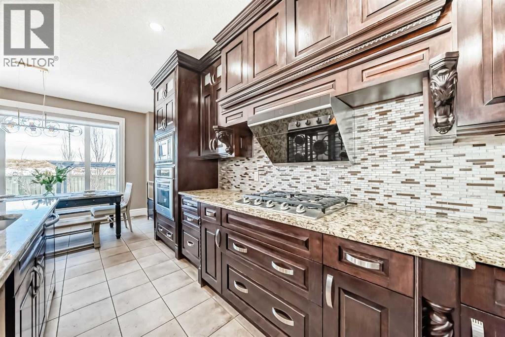 115 Wentworth Hill Sw, Calgary, AB - Indoor Photo Showing Kitchen With Upgraded Kitchen