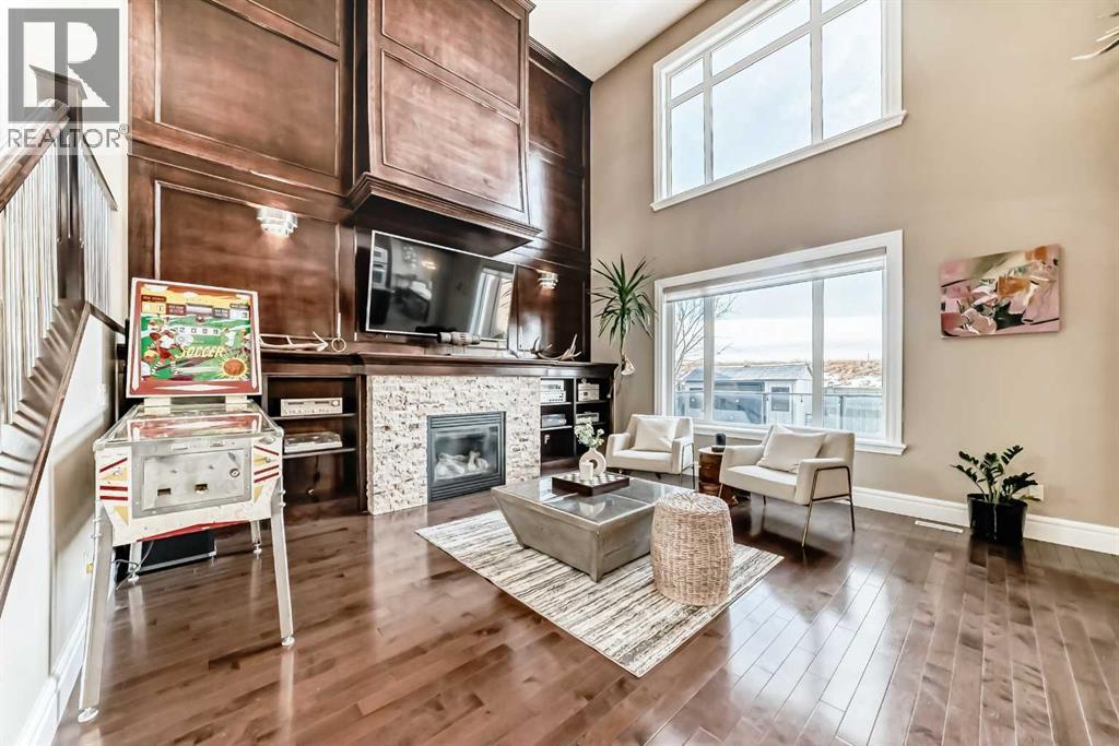 115 Wentworth Hill Sw, Calgary, AB - Indoor Photo Showing Living Room With Fireplace