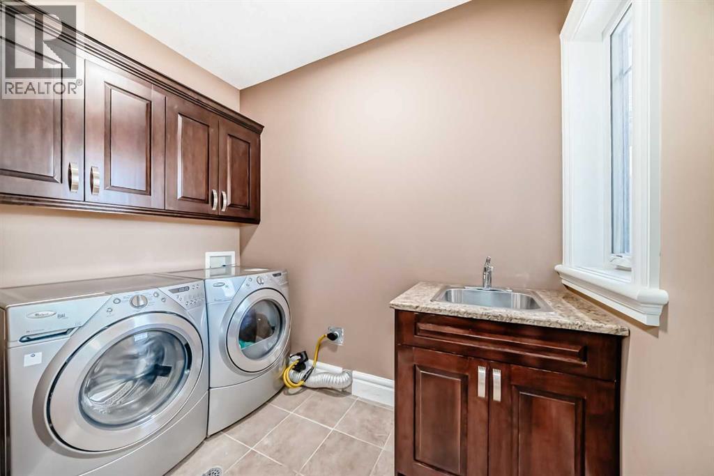 115 Wentworth Hill Sw, Calgary, AB - Indoor Photo Showing Laundry Room